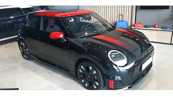 Foto de um mini cooper se