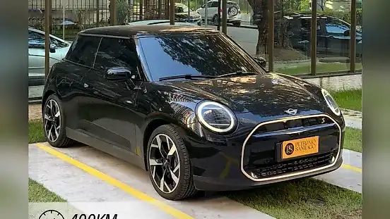 Foto de um mini cooper se