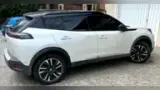 Peugeot E-2008 - Miniatura 4